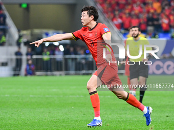 In Qingdao, China, on October 15, 2024, a photo shows Chinese soccer players during their match against Indonesia at home in the 4th round o...