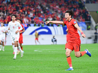 In Qingdao, China, on October 15, 2024, a photo shows Chinese soccer players during their match against Indonesia at home in the 4th round o...