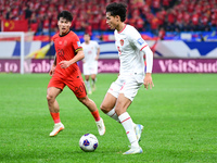 In Qingdao, China, on October 15, 2024, a photo shows Chinese soccer players during their match against Indonesia at home in the 4th round o...