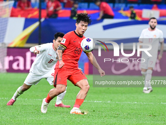 In Qingdao, China, on October 15, 2024, a photo shows Chinese soccer players during their match against Indonesia at home in the 4th round o...