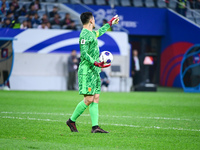 In Qingdao, China, on October 15, 2024, a photo shows Chinese soccer players during their match against Indonesia at home in the 4th round o...