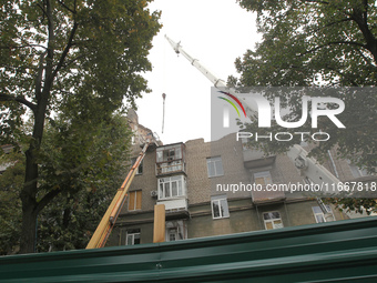 The apartment block in Vokzalna Square, Dnipro, Ukraine, is being dismantled on October 14, 2024. A Russian missile hit this location on Apr...