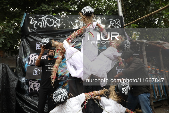 Junior doctors make effigies disputing health corruption during a protest carnival organized as the ''Droho carnival,'' demanding the West B...