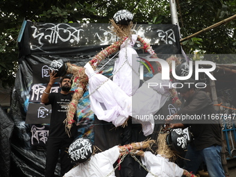 Junior doctors make effigies disputing health corruption during a protest carnival organized as the ''Droho carnival,'' demanding the West B...