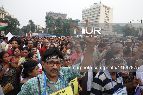 Doctors and citizens shout slogans during a protest carnival, the ''Droho carnival,'' demanding that India's West Bengal state government pr...