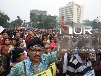 Doctors and citizens shout slogans during a protest carnival, the ''Droho carnival,'' demanding that India's West Bengal state government pr...