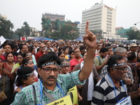 Doctors and citizens shout slogans during a protest carnival, the ''Droho carnival,'' demanding that India's West Bengal state government pr...