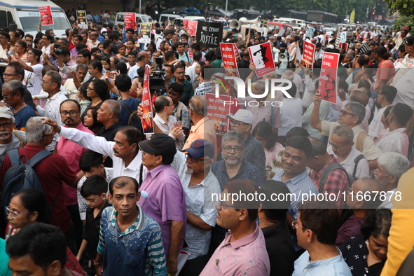 Doctors and citizens shout slogans during a protest carnival, the ''Droho carnival,'' demanding that India's West Bengal state government pr...