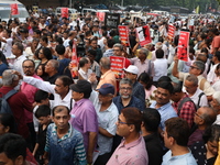 Doctors and citizens shout slogans during a protest carnival, the ''Droho carnival,'' demanding that India's West Bengal state government pr...