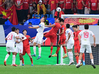 The photo shows Chinese soccer players during their match against Indonesia at home in the 4th round of World Qualifiers Asian Zone in Qingd...