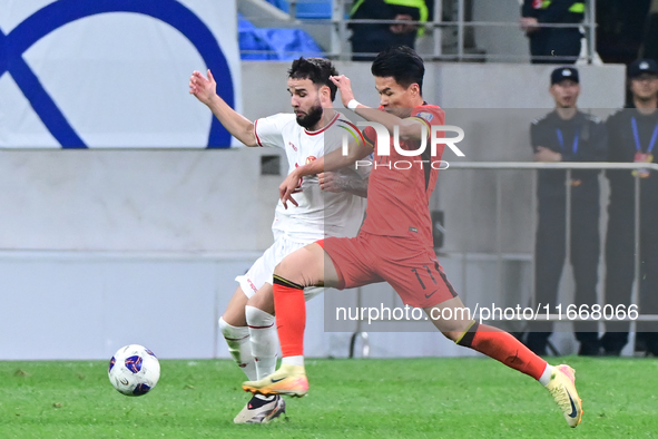 The photo shows Chinese soccer players during their match against Indonesia at home in the 4th round of World Qualifiers Asian Zone in Qingd...