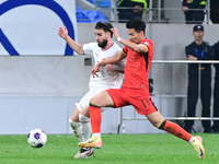 The photo shows Chinese soccer players during their match against Indonesia at home in the 4th round of World Qualifiers Asian Zone in Qingd...