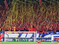 Fans cheer for China during their football match against Indonesia in the fourth round of the World Cup Qualifiers in Qingdao, China, on Oct...