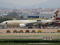 A Boeing 777-FFX of Etihad Cargo is parked in the parking area of Barcelona airport unloading, in Barcelona, Spain, on October 15, 2024. (