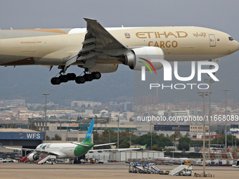 A Boeing 777-FFX of Etihad Cargo lands at Barcelona El Prat airport in Barcelona, Spain, on October 15, 2024. (