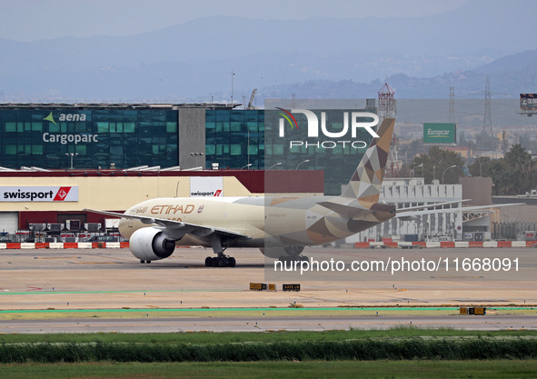 A Boeing 777-FFX of Etihad Cargo heads to the parking area of Barcelona airport to unload in Barcelona, Spain, on October 15, 2024. 