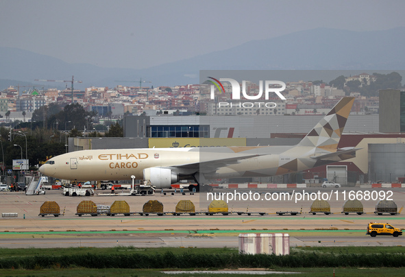 A Boeing 777-FFX of Etihad Cargo parks in the parking area of Barcelona airport to unload, in Barcelona, Spain, on October 15, 2024. 