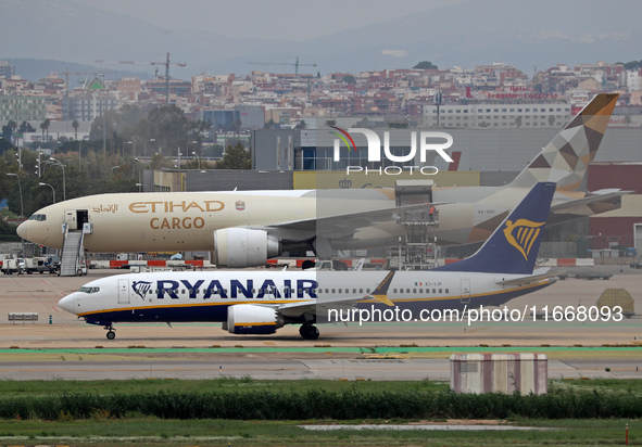 A Boeing 777-FFX of Etihad Cargo is parked in the parking area of Barcelona airport unloading, in Barcelona, Spain, on October 15, 2024. 