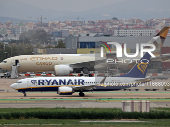 A Boeing 777-FFX of Etihad Cargo is parked in the parking area of Barcelona airport unloading, in Barcelona, Spain, on October 15, 2024. (