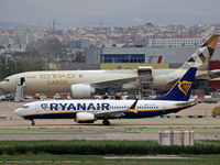 A Boeing 777-FFX of Etihad Cargo is parked in the parking area of Barcelona airport unloading, in Barcelona, Spain, on October 15, 2024. (