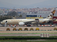 A Boeing 777-FFX of Etihad Cargo is parked in the parking area of Barcelona airport unloading, in Barcelona, Spain, on October 15, 2024. (