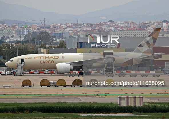 A Boeing 777-FFX of Etihad Cargo is parked in the parking area of Barcelona airport unloading, in Barcelona, Spain, on October 15, 2024. 