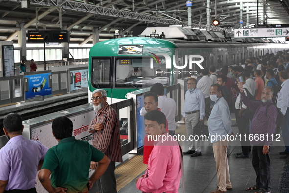 Passengers are able to board the metro rail from the Mirpur-10 station in Dhaka, Bangladesh, on October 15, 2024. The Dhaka Mirpur-10 metro...