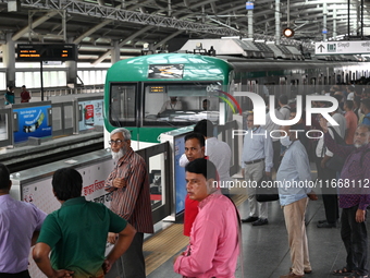 Passengers are able to board the metro rail from the Mirpur-10 station in Dhaka, Bangladesh, on October 15, 2024. The Dhaka Mirpur-10 metro...