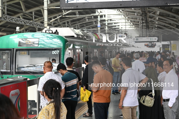 Passengers are able to board the metro rail from the Mirpur-10 station in Dhaka, Bangladesh, on October 15, 2024. The Dhaka Mirpur-10 metro...