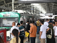 Passengers are able to board the metro rail from the Mirpur-10 station in Dhaka, Bangladesh, on October 15, 2024. The Dhaka Mirpur-10 metro...