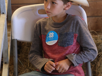 A young cowboy participates in the 180th annual Markham Fall Fair in Markham, Ontario, Canada, on October 5, 2024. (