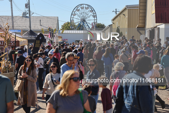 A crowd of people attends the 180th annual Markham Fall Fair in Markham, Ontario, Canada, on October 5, 2024. 