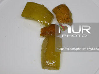 View of caramelized citrus fruits in Mexico City, Mexico, on the eve of the Day of the Dead, to make Pan de Muerto. According to historical...