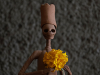 Various producers of Cempasuchil Flower, Pan de Muerto, Calaveritas de Azucar, and Pulque de Flor Cempasuchil prepare to sell their products...