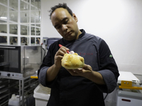 Preparation of Pan de Muerto in Mexico City, Mexico, on the eve of the Day of the Dead. According to historical documents and accounts, in a...