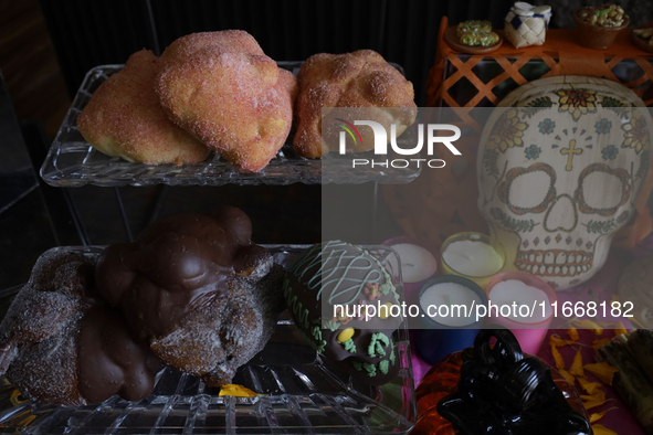 A view of Pan de Muerto in front of an offering in Mexico City, Mexico, on the eve of the Day of the Dead. According to historical documents...