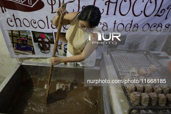 Chocolate mix is used to make and sell chocolate skulls in Mexico City, Mexico, on the eve of Day of the Dead. Sugar skulls are made from al...