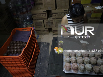 Decorated chocolate skulls are for sale in Mexico City, Mexico, on the eve of the Day of the Dead. Sugar skulls are made from alfenique, whi...