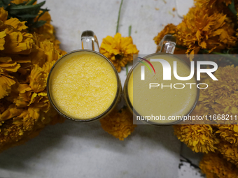 Pulque with Cempasuchil flower petals is viewed in Mexico City, Mexico, on the eve of the Day of the Dead. Pulque is an alcoholic beverage o...