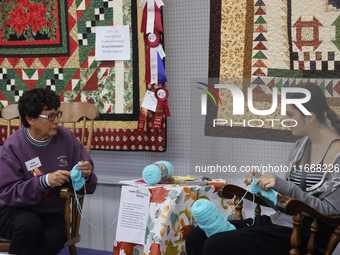 People crochet during the 180th annual Markham Fall Fair in Markham, Ontario, Canada, on October 5, 2024. (