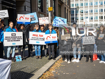 Singer Sarah Connor lies in a mini-aquarium and protests with Peta activists in front of a Tui travel agency for the release of orca whales...