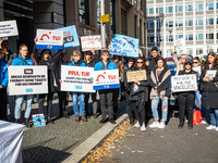 Singer Sarah Connor lies in a mini-aquarium and protests with Peta activists in front of a Tui travel agency for the release of orca whales...