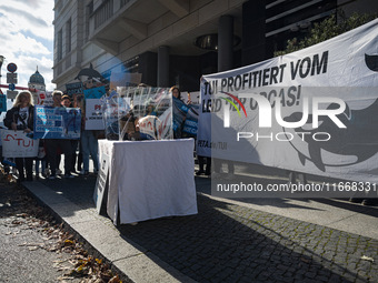 Singer Sarah Connor lies in a mini-aquarium and protests with Peta activists in front of a Tui travel agency for the release of orca whales...