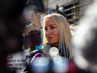 Singer Sarah Connor lies in a mini-aquarium and protests with Peta activists in front of a Tui travel agency for the release of orca whales...