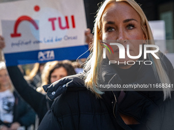 Singer Sarah Connor lies in a mini-aquarium and protests with Peta activists in front of a Tui travel agency for the release of orca whales...