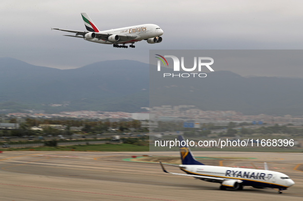 An Emirates Airbus A380-861 lands at Barcelona El Prat Airport in Barcelona, Spain, on October 15, 2024. 