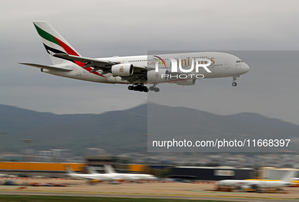 An Emirates Airbus A380-861 lands at Barcelona El Prat Airport in Barcelona, Spain, on October 15, 2024. 