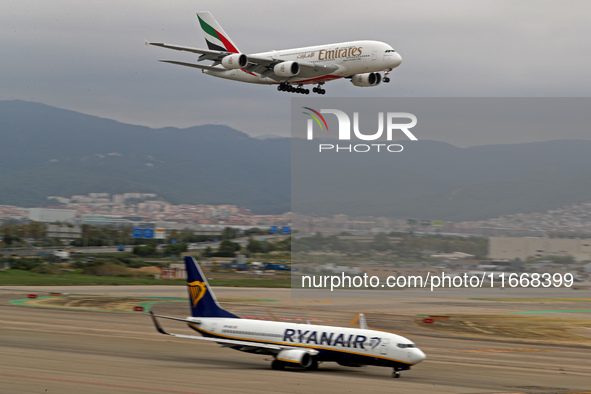 An Emirates Airbus A380-861 lands at Barcelona El Prat Airport in Barcelona, Spain, on October 15, 2024. 