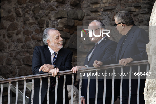 US director Francis Ford Coppola, flanked by Rome's mayor Roberto Gualtieri, admires the view from a balcony of the Capitole Palace overlook...