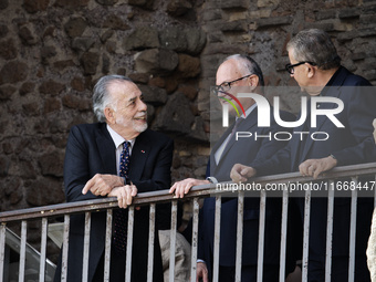 US director Francis Ford Coppola, flanked by Rome's mayor Roberto Gualtieri, admires the view from a balcony of the Capitole Palace overlook...